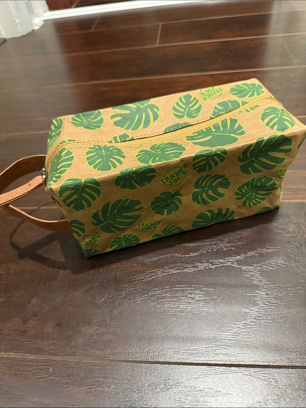 Trader Joe’s cosmetic bag toiletry bag with green tropical leaf print